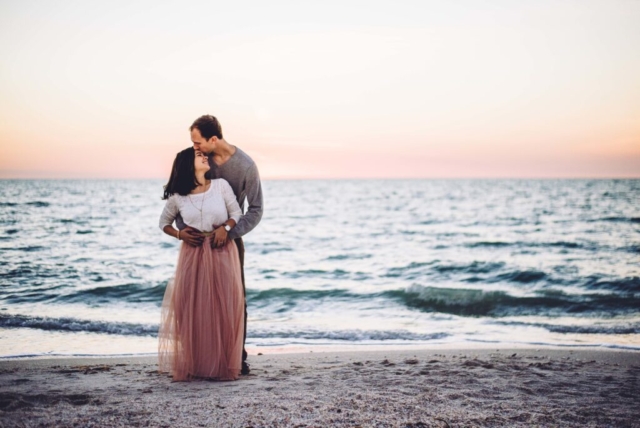 Bride and groom exchange vows at Hotel Escalante Naples wedding venue