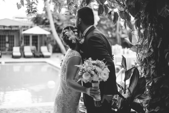 Naples Florida wedding, couple’s first look in Hotel Escalante courtyard