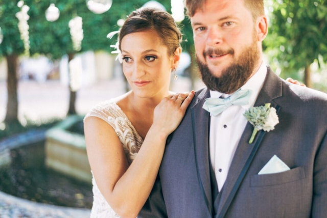 Bride and groom’s portrait in Hotel Escalante courtyard, Naples wedding photographer