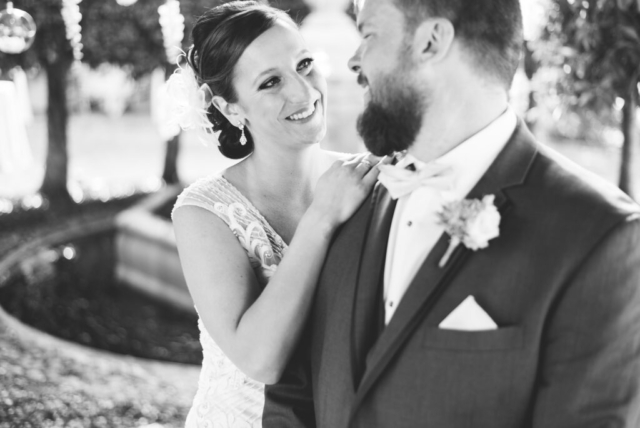 Bride and groom’s first dance under lights at Hotel Escalante, Naples wedding