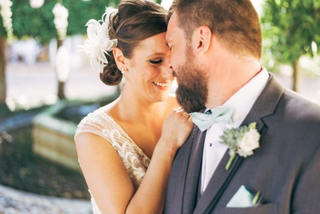 Naples Florida wedding photographer, couple’s romantic embrace at Hotel Escalante
