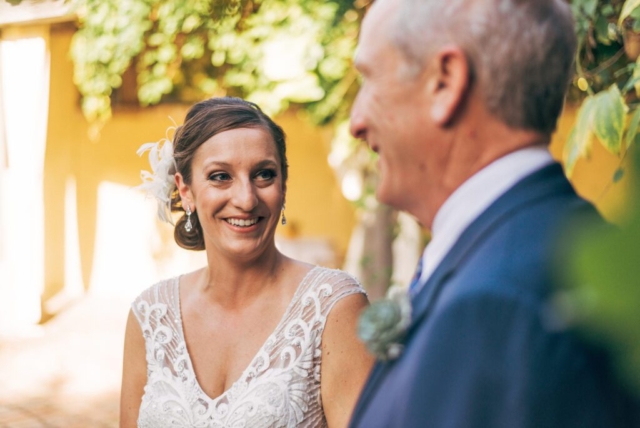 Naples Florida wedding, couple’s first look in Hotel Escalante courtyard