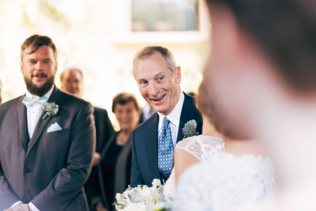Bride and groom under string lights at Hotel Escalante, Naples wedding