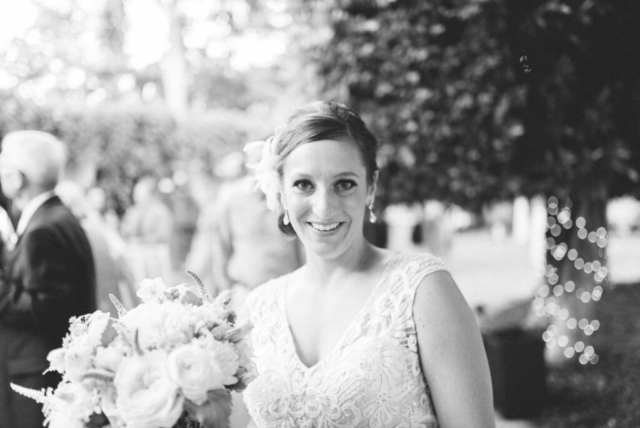 Bride walking through Hotel Escalante gardens, Naples Florida wedding