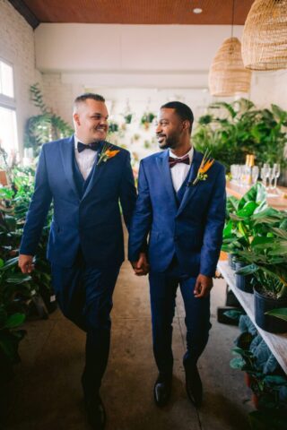 Fancy Free Nursery's beautiful outdoor setting for a petite elopement wedding featuring a same-sex couple
