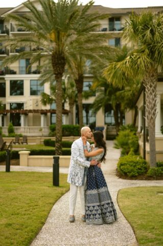 dru-puja-jekyll-island-indian-wedding-portrait-stills-by-hernan.jpg Dru and Puja embrace under a marigold mandap at Jekyll Island, Georgia. Indian wedding portrait by Tampa Wedding Photographer Stills by Hernan, florals by @bloomingluxevents