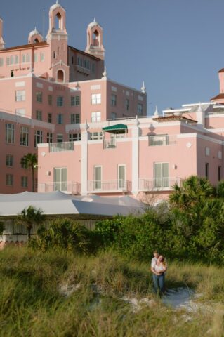 Ashley & Sam’s Luxury Don CeSar Engagement Photos | St. Pete Beach Photography by Stills by Hernan Ashley and Sam share a romantic sunset embrace at The Don CeSar in St. Pete Beach, Florida, photographed by Stills by Hernan