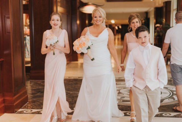 Naples Florida wedding photographer, couple’s joyful exit on Marco Island beach