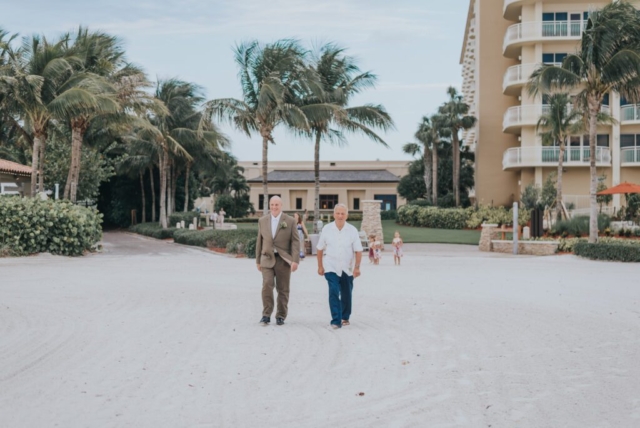 Naples Florida wedding photographer, couple’s walk along the shore at JW Marriott Marco