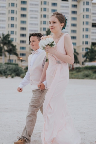 Naples Florida wedding photographer, couple’s laughter on the beach at JW Marriott Marco