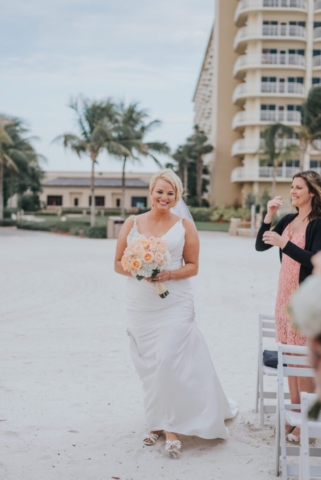 Naples Florida wedding photographer, couple’s joyful exit at JW Marriott Marco