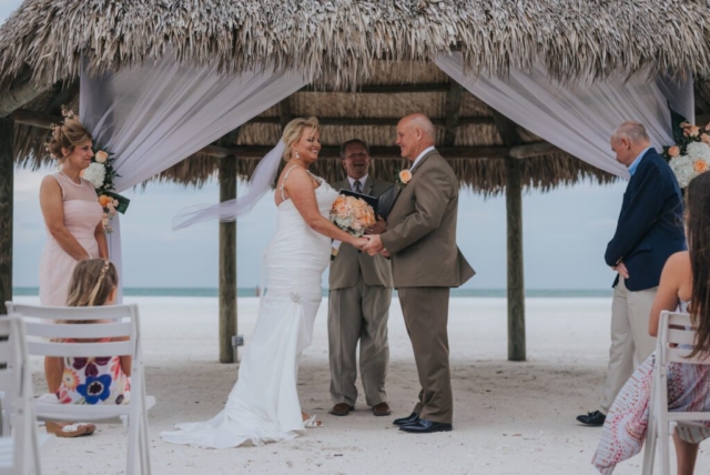 Elegant floral arch by Tom Trovato at JW Marriott Marco Island wedding