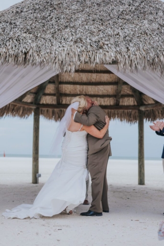Naples Florida wedding photographer, candid beach celebration at JW Marriott
