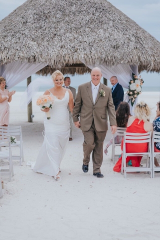 Naples Florida wedding photographer, bride’s veil blowing in Marco Island breeze