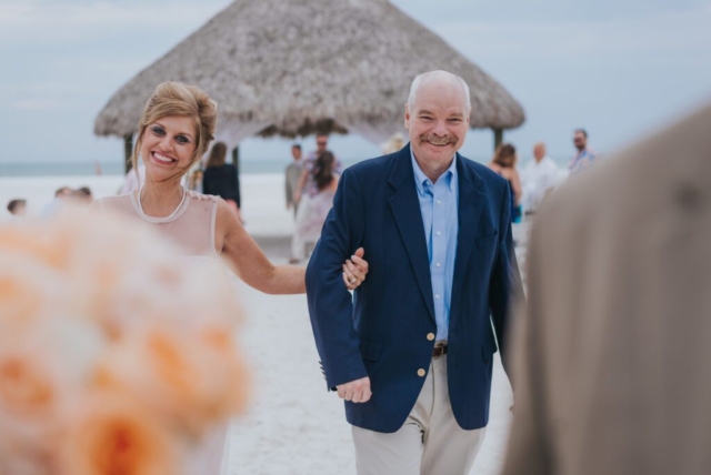 Naples Florida wedding photographer, couple’s joyful walk at JW Marriott Marco