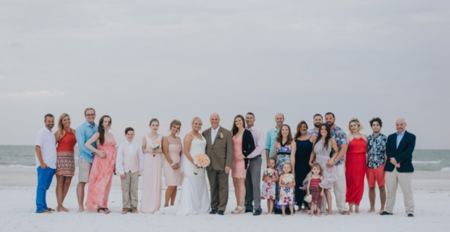 Bride and groom kiss on the sand, JW Marriott Marco wedding photographer